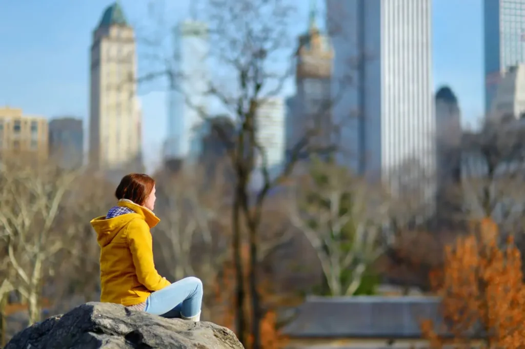 A New Yorker with depression and anxiety sitting in central park